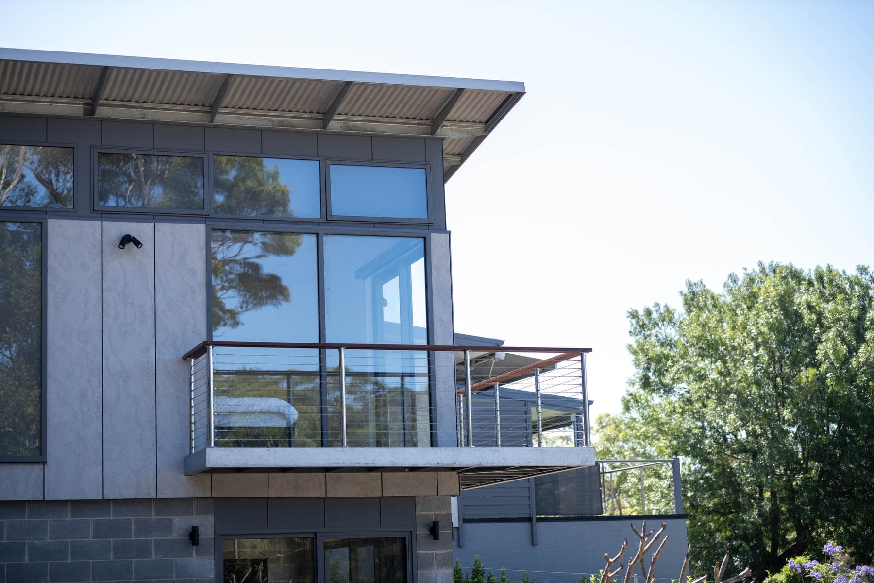 Finished home with a modern roofline on a rebuilt site, Batemans Bay
