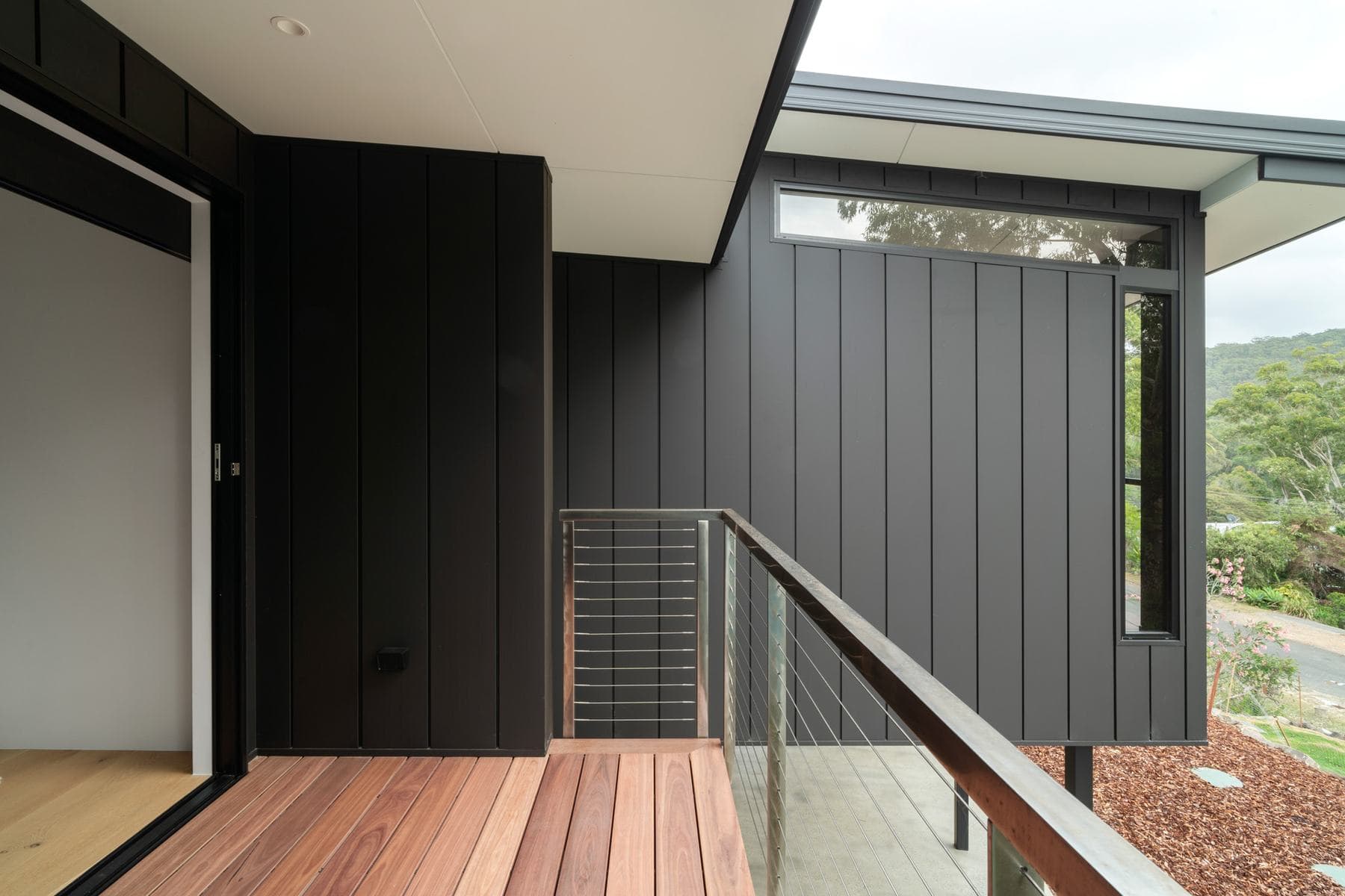 Balcony and black cladding on a well-insulated home, NSW South Coast