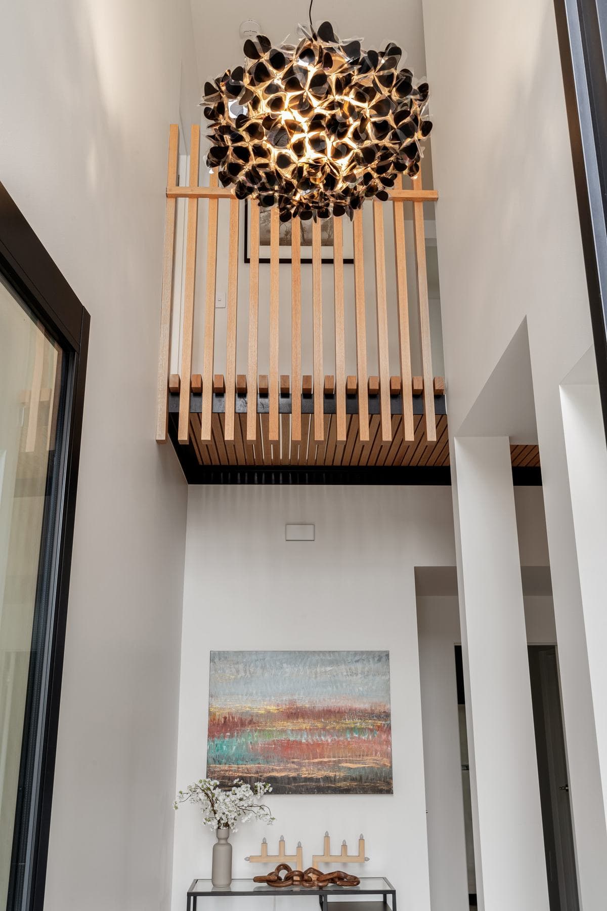 Timber battens and a high, well-glazed void in a thermally efficient home