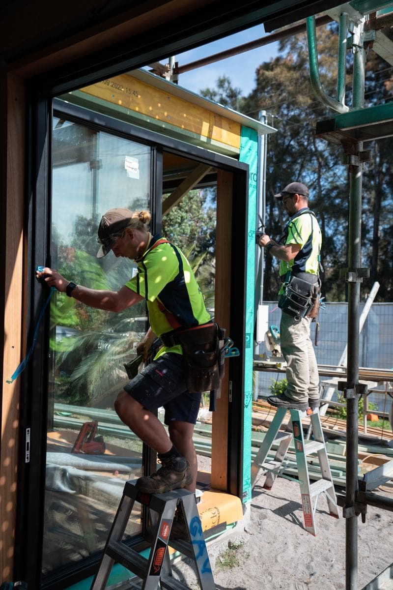 Perrem builders fitting glazing on site